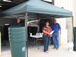 A happy customer at the rain barrel event.